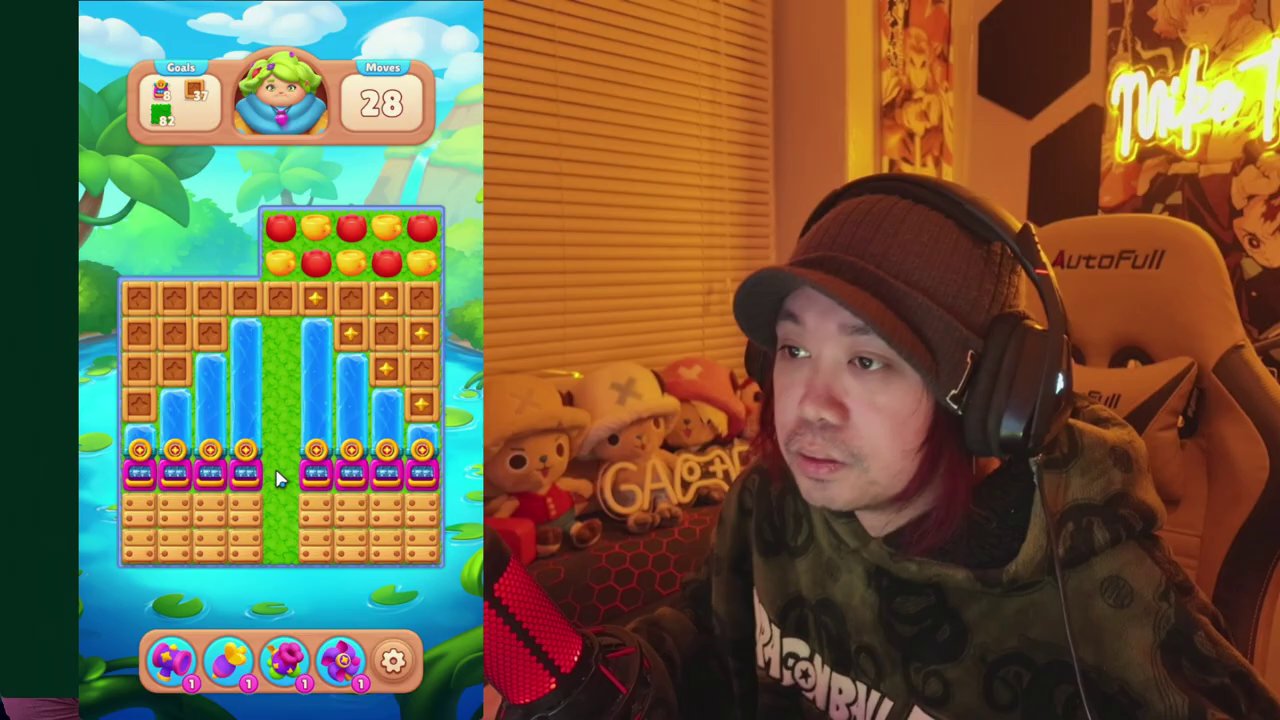 A screenshot of Level 26 gameplay, showing a board filled with colorful gems, blocks, and ice tiles.