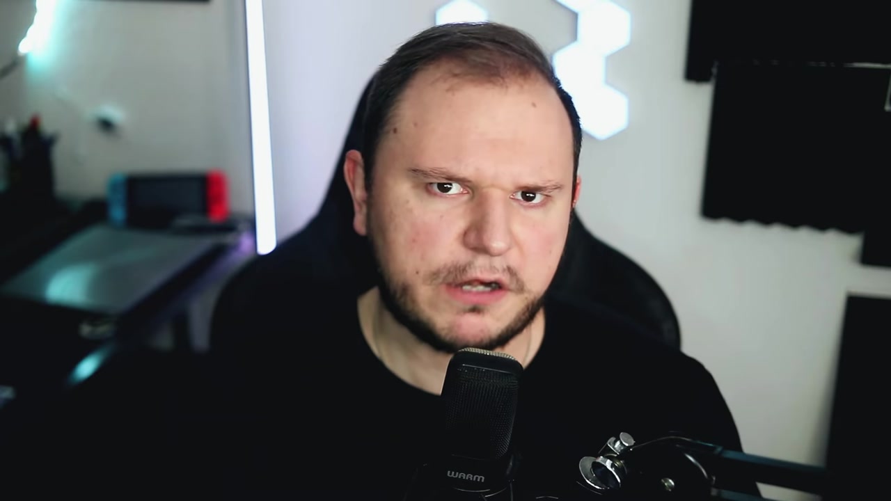 Gameplay screenshot from a Bitcoin-themed bubble shooter game, showing colorful balls and a score counter.