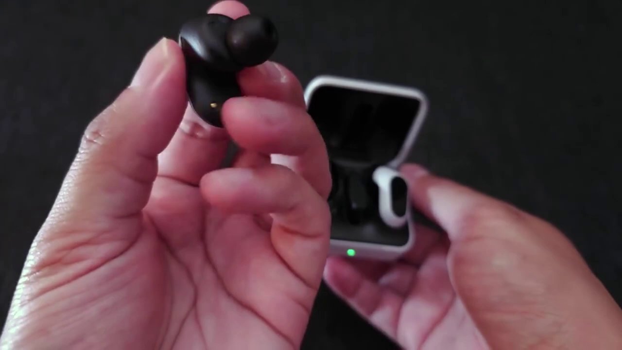 The ASUS ROG Cetra True Wireless Ultra earbuds are displayed prominently, showcasing their premium design and RGB lighting accents.