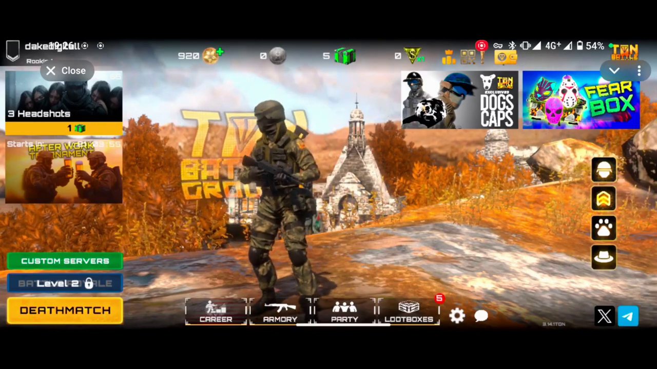 A gamer wearing earbuds, intensely focused on a competitive first-person shooter on a monitor.